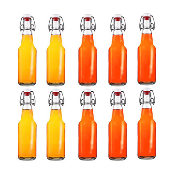 Wholesale Clear Round Glass Beer Bottles Beverage bottles with swing top